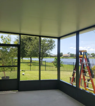 Screened enclosure with waterfront views and black aluminum frame